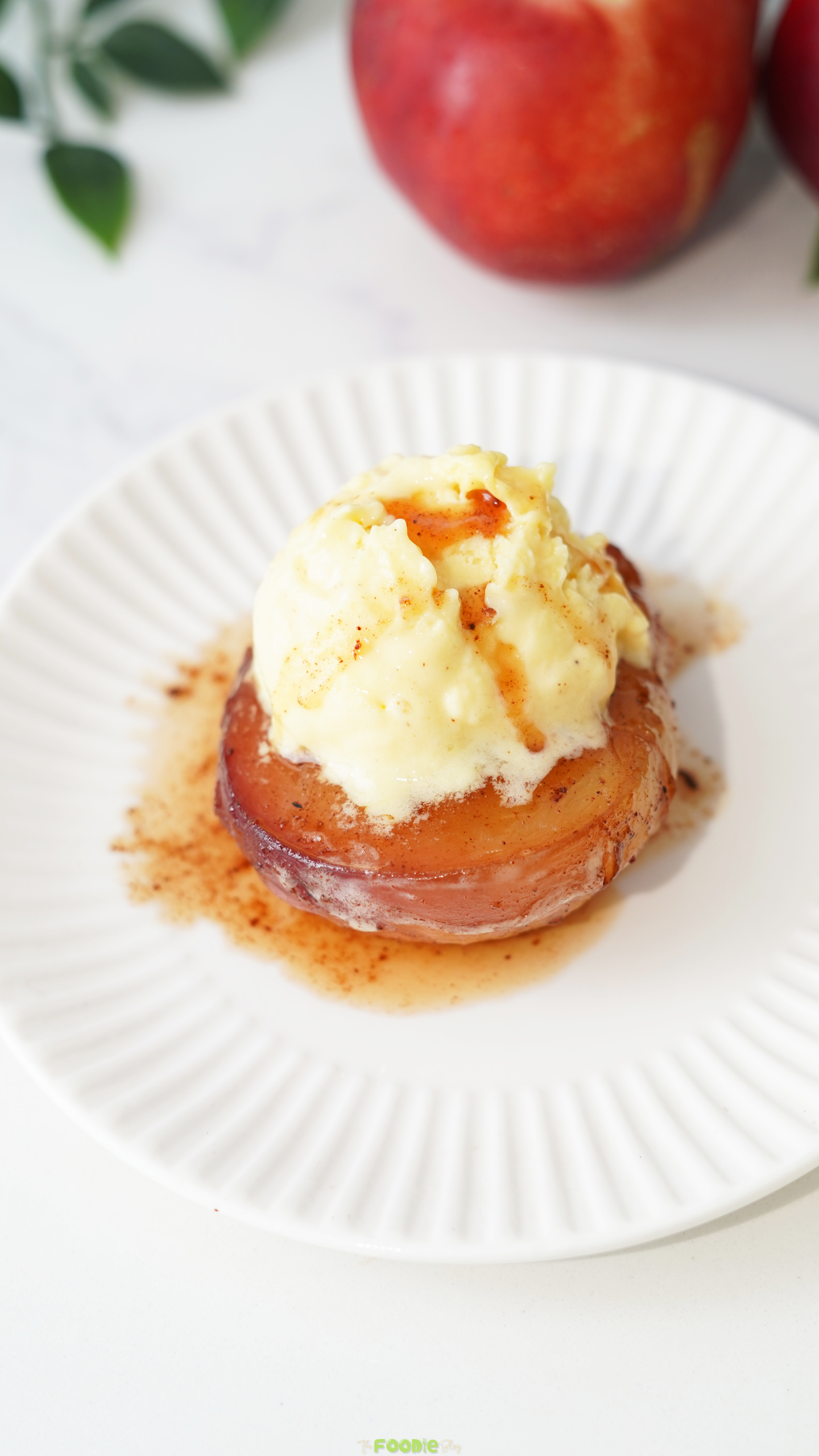Warm baked peach topped with melting vanilla ice cream and honey cinnamon sauce.