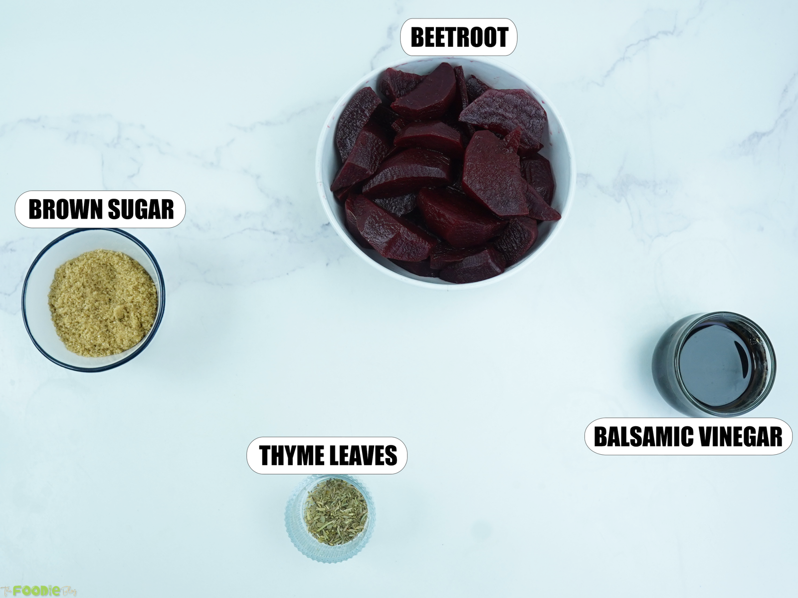 Ingredients for Balsamic Glazed Beetroot with cooked beetroot, brown sugar, thyme leaves, and balsamic vinegar.