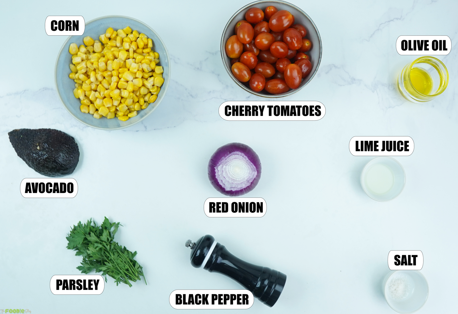 Corn, cherry tomatoes, avocado, red onion, parsley, olive oil, lime juice, salt, and black pepper for grilled corn salad.