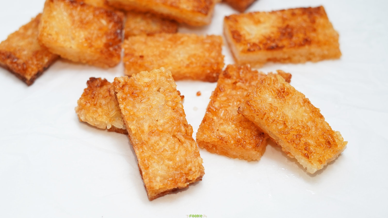 Homemade crispy rice pieces with golden tops and tender white rice centers