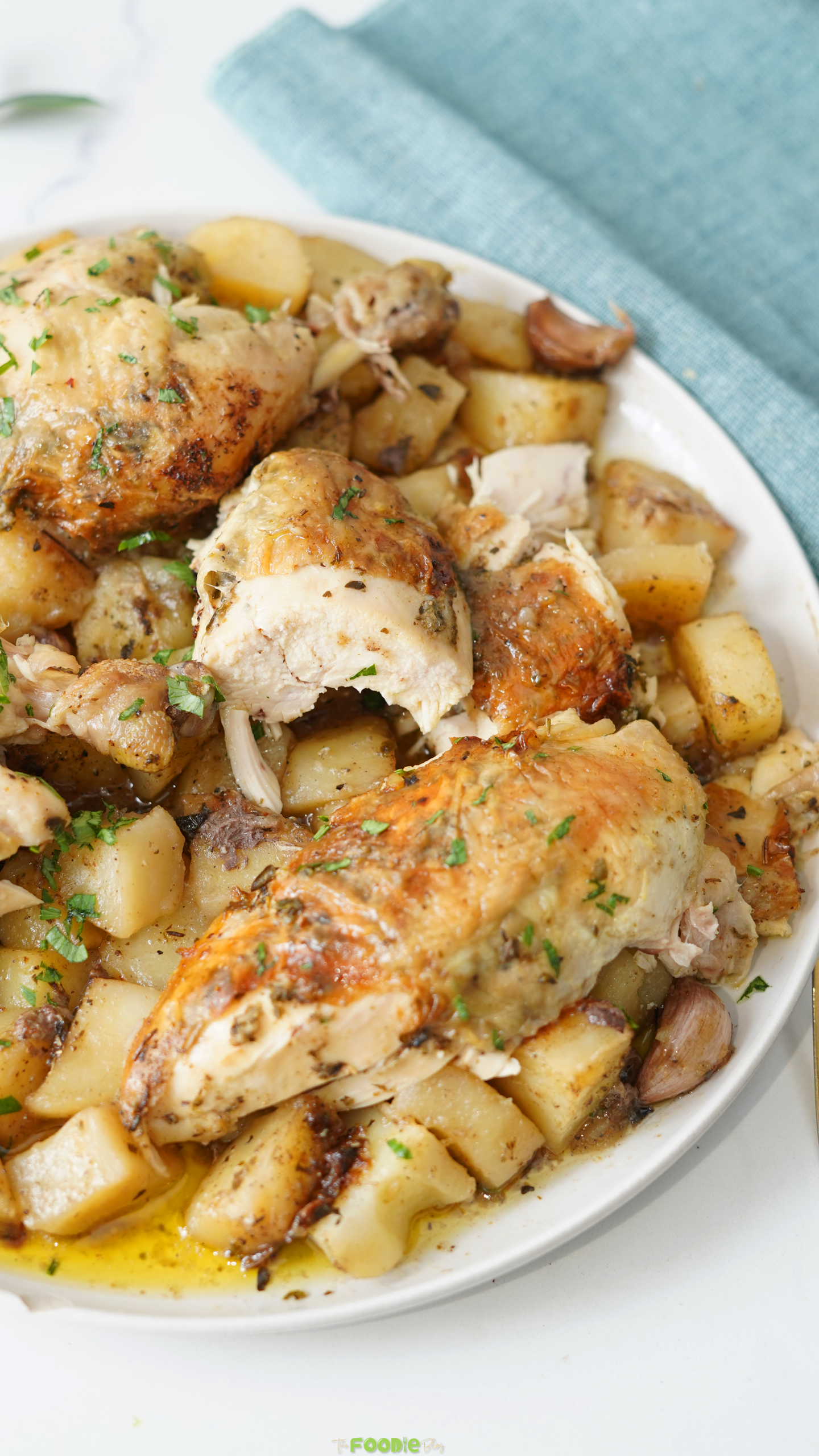 Poulet rôti with golden roasted chicken and garlic herb potatoes
