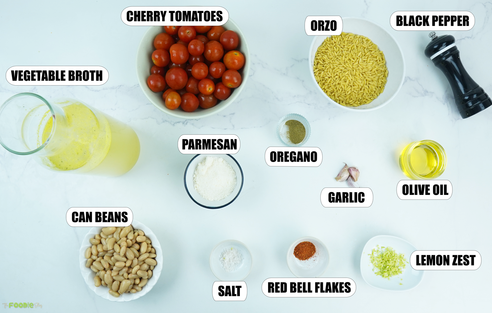 Ingredients for tomato orzo with butter beans, cherry tomatoes, Parmesan, garlic and vegetable broth