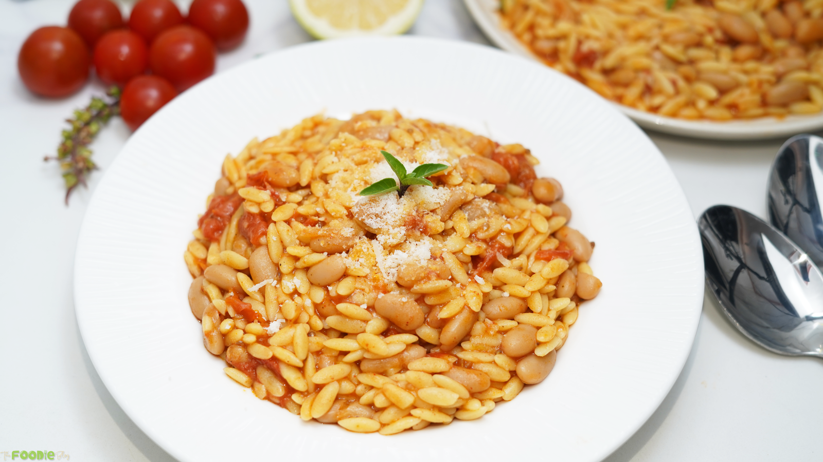 Tomato orzo with butter beans, Parmesan and fresh basil