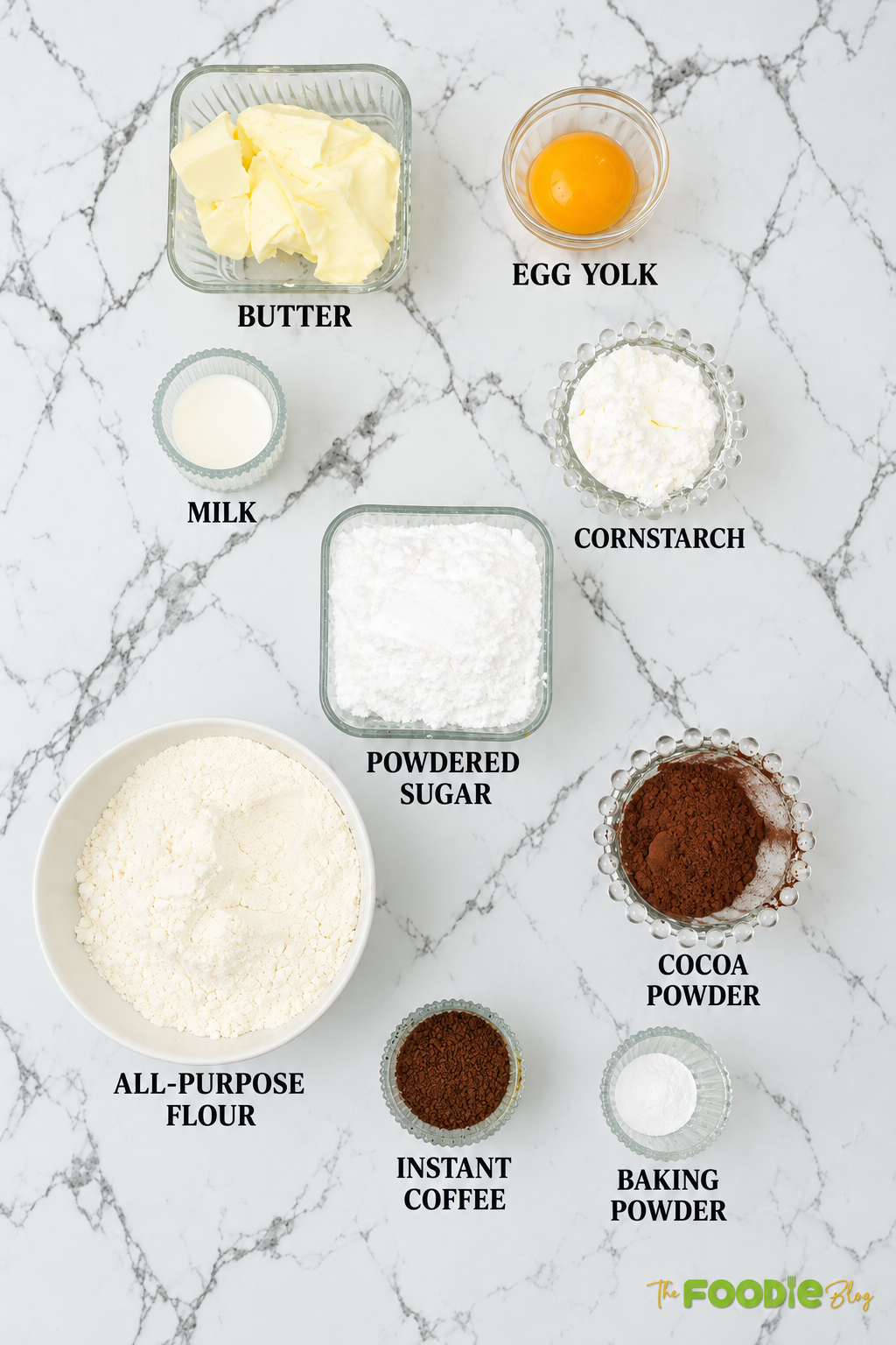 Ingredients for coffee cookies including butter, egg yolk, milk, cornstarch, powdered sugar, flour, cocoa powder, instant coffee, and baking powder