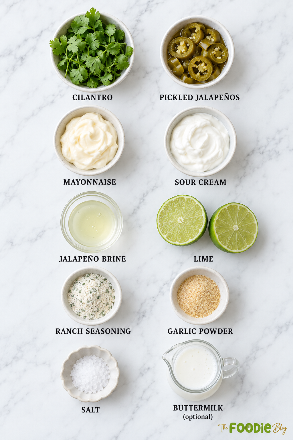 Ingredients for jalapeño ranch including cilantro, pickled jalapeños, mayonnaise, sour cream, lime, ranch seasoning, garlic powder, salt, jalapeño brine, and buttermilk