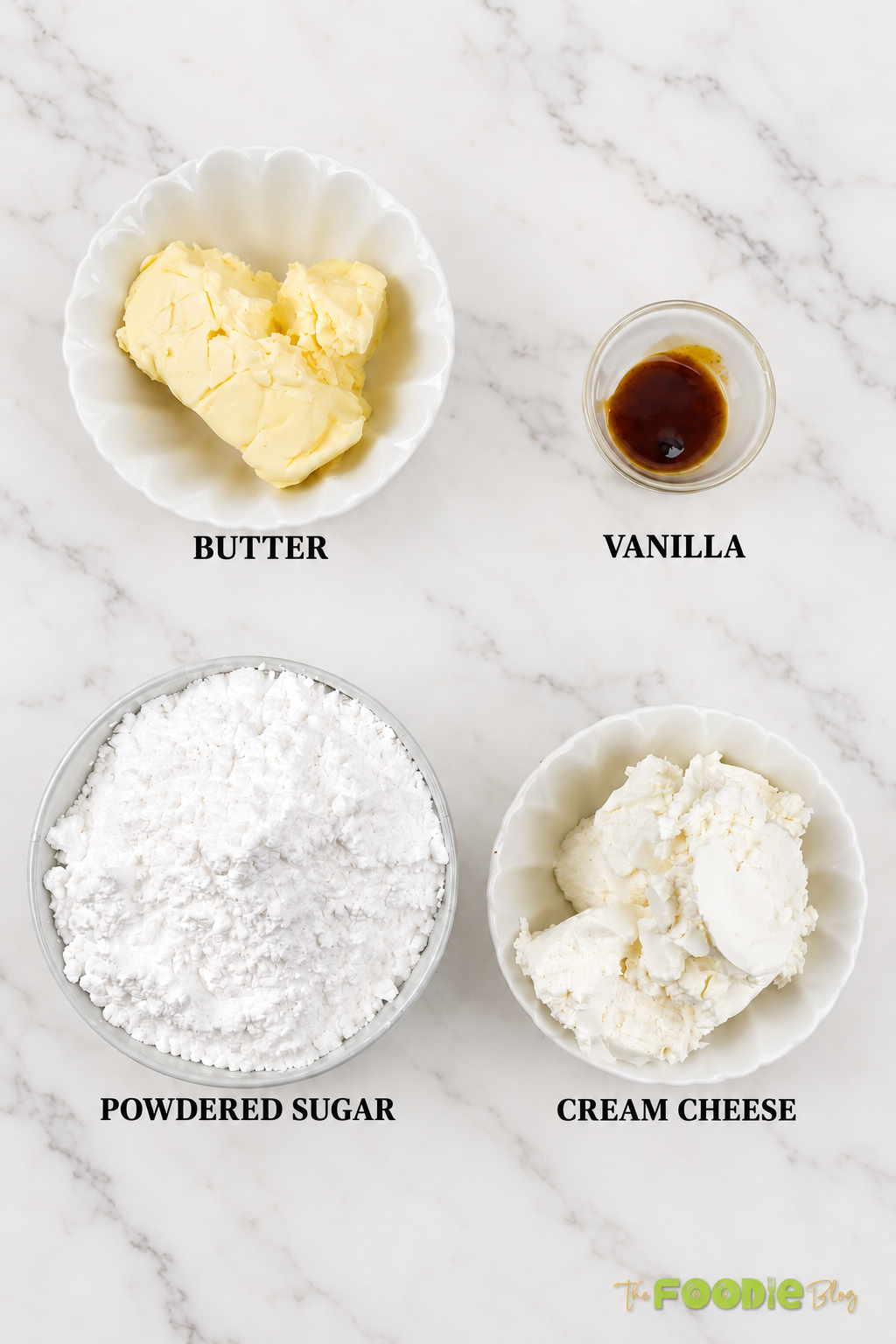 Cream cheese frosting ingredients including butter, cream cheese, powdered sugar, and vanilla