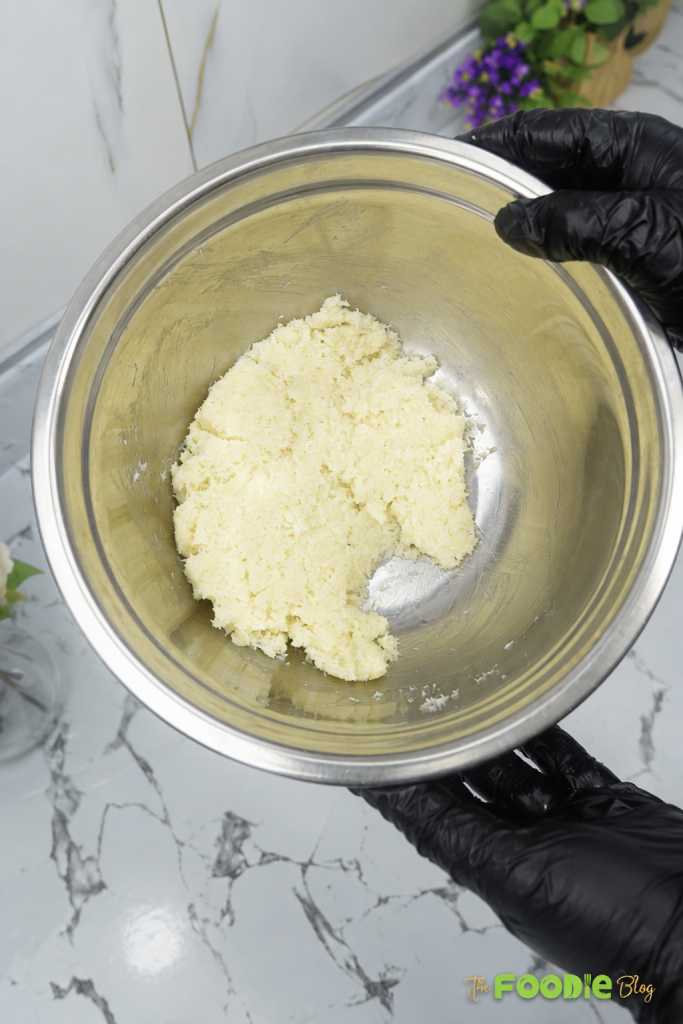 Thick coconut and condensed milk mixture ready for shaping into balls