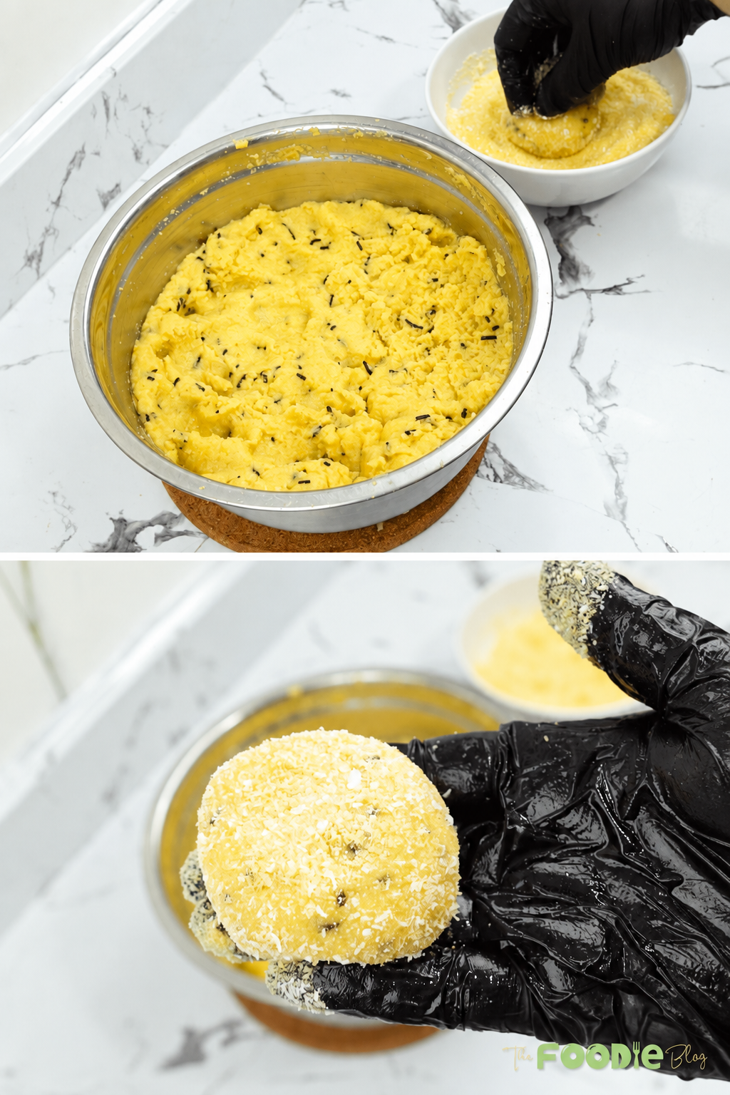 Semolina cookie dough ball being coated in semolina and coconut mixture