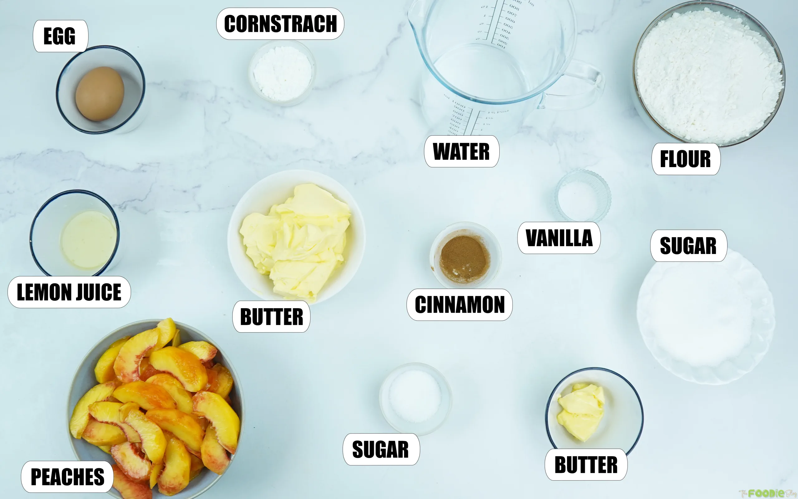 Fresh peaches, flour, butter, sugar, cornstarch, cinnamon, vanilla, lemon juice, egg, and water for peach pie.