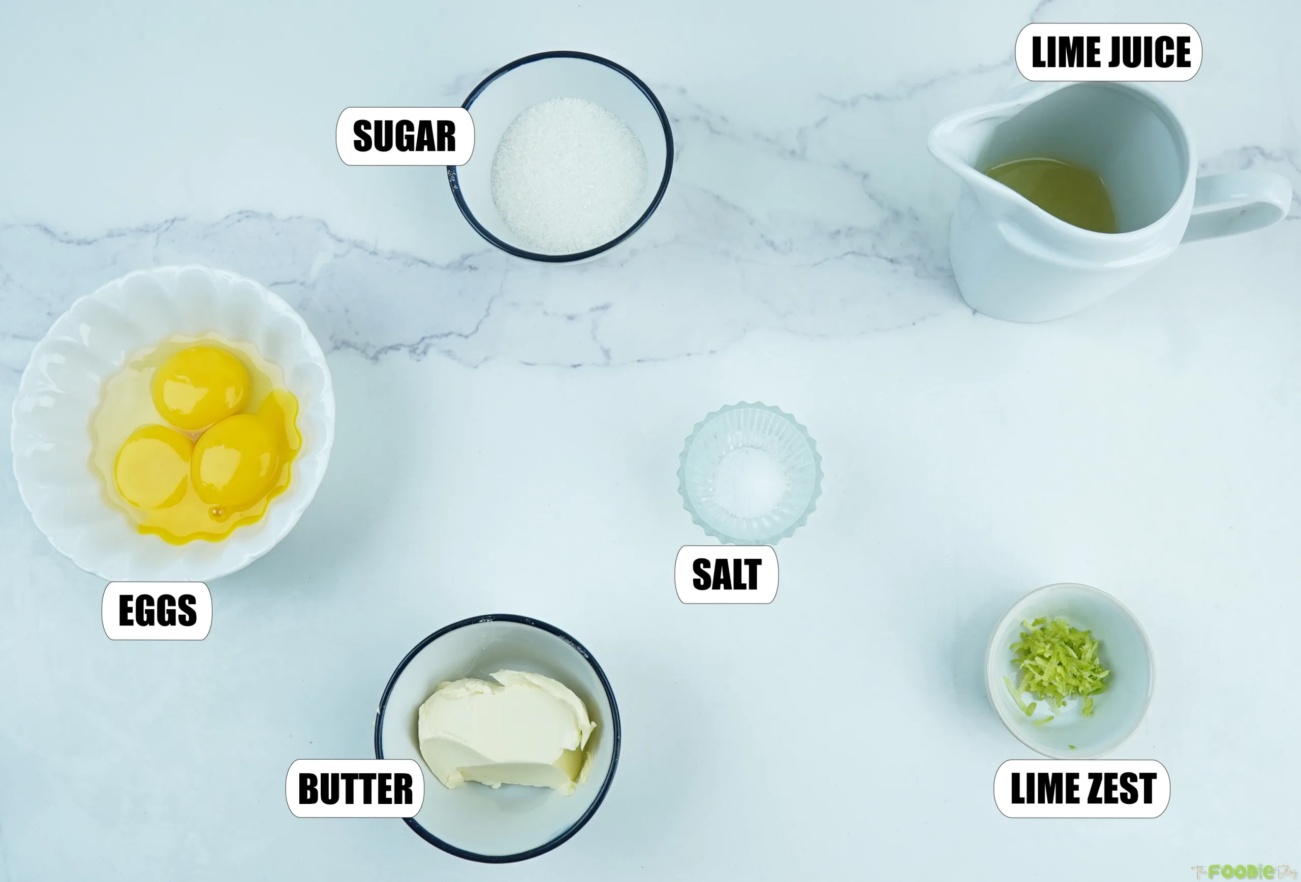 Sugar, lime juice, lime zest, egg yolks, butter, and salt for homemade lime curd.