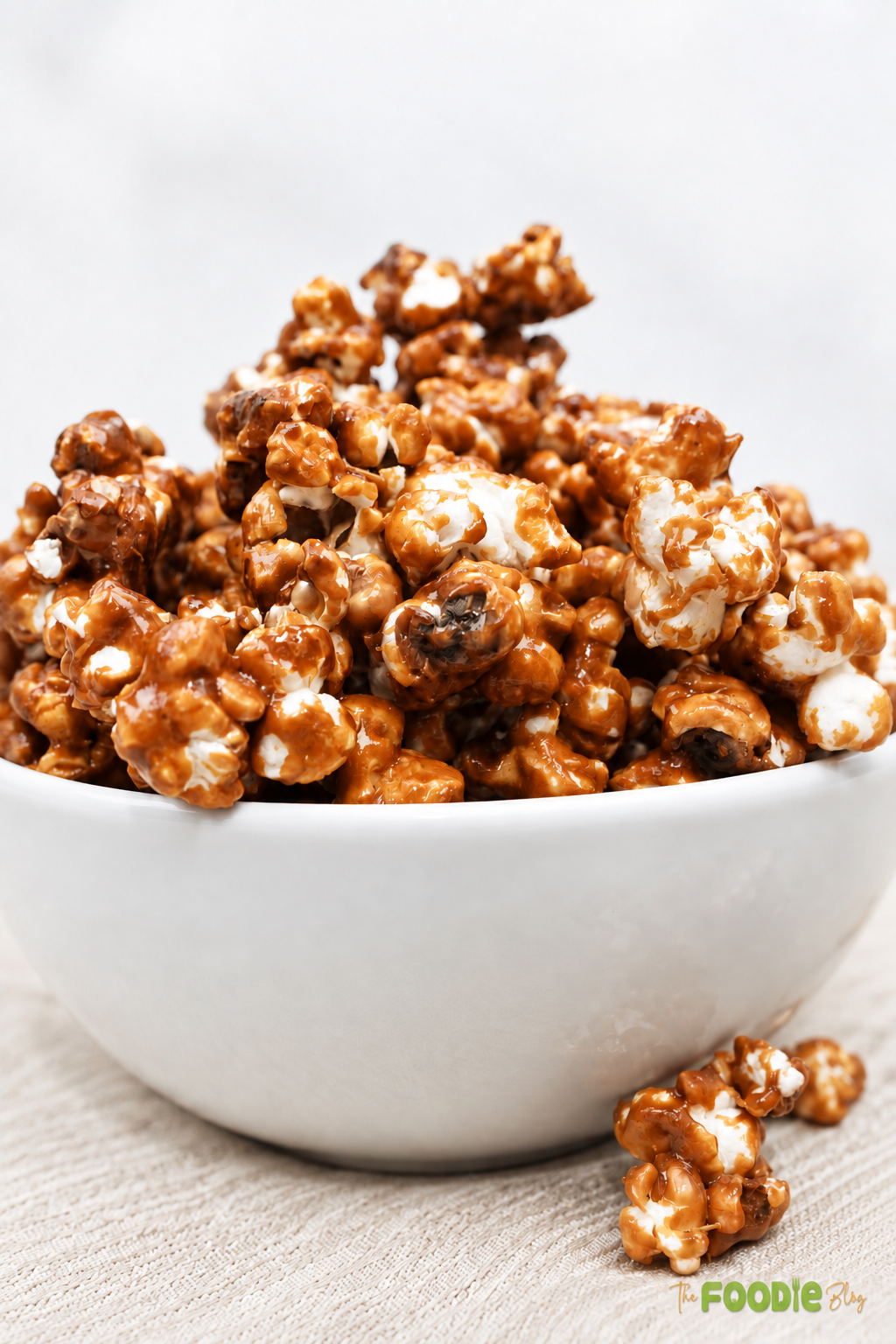 Close-up of crunchy caramel popcorn coated in glossy homemade caramel.