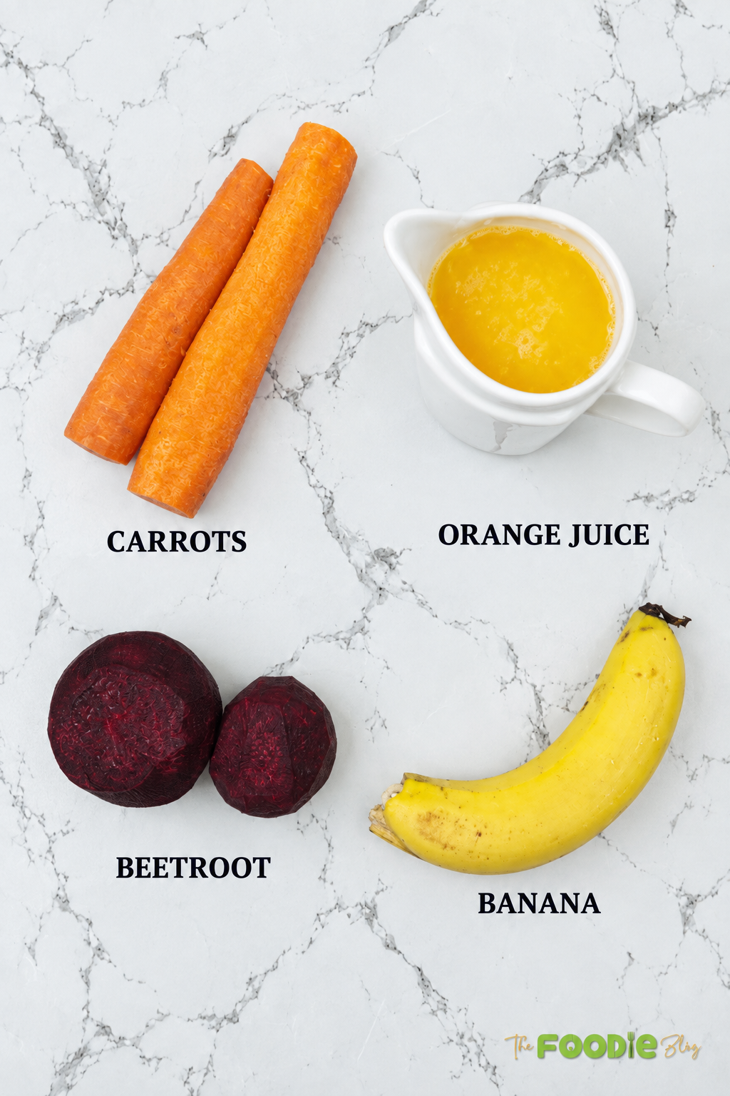 Ingredients for beetroot juice including carrots, orange juice, beetroot, and banana.
