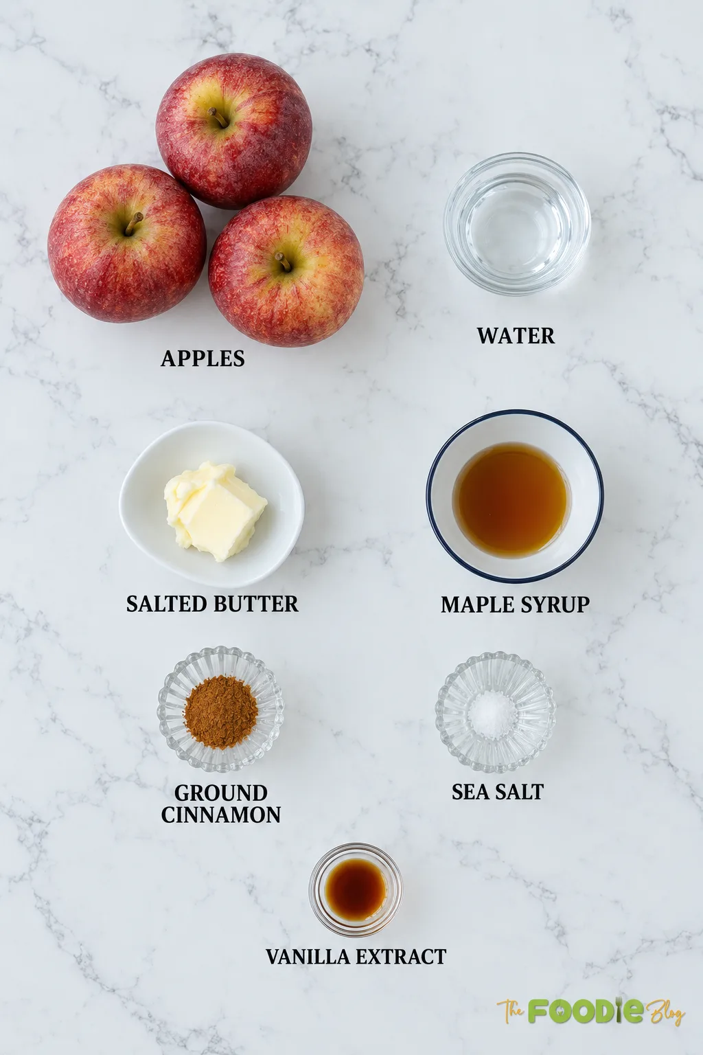Ingredients for stovetop cinnamon apples with apples, butter, maple syrup, cinnamon, salt, and vanilla