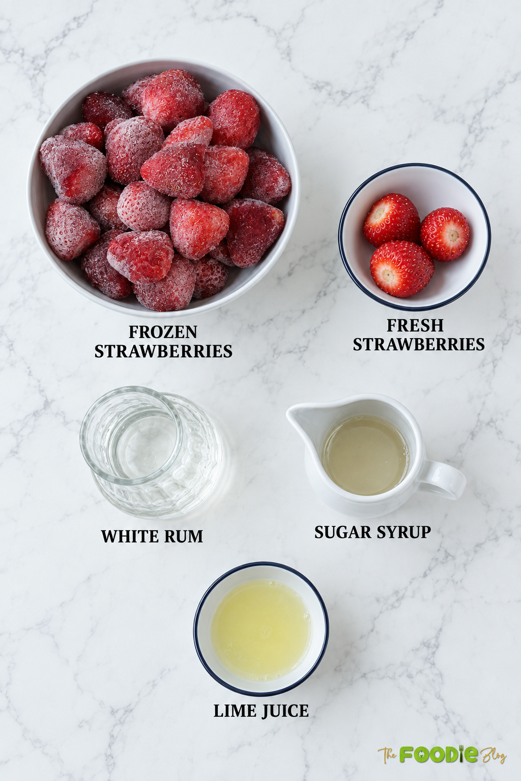 Frozen strawberries, fresh strawberries, white rum, sugar syrup, and fresh lime juice for strawberry daiquiris.