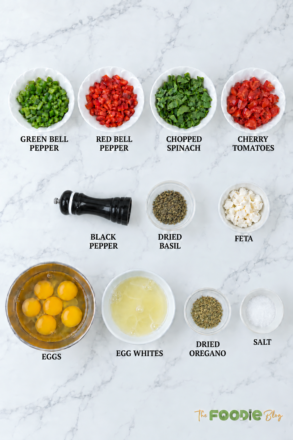 Egg muffin ingredients including eggs, egg whites, spinach, bell peppers, cherry tomatoes, feta, and seasonings.