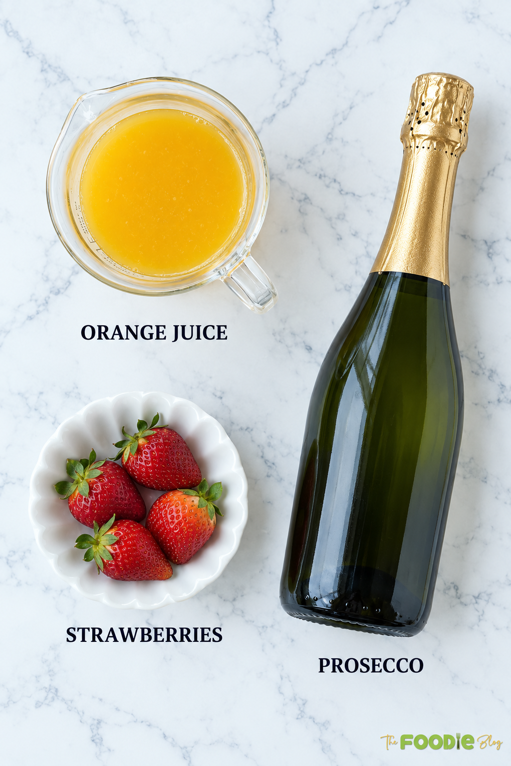 Orange juice, sparkling wine, and fresh strawberries for making mimosas.
