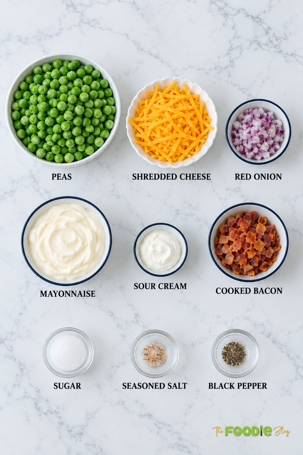 Ingredients for pea salad including peas, cheddar cheese, red onion, mayonnaise, sour cream, bacon, sugar, salt, and pepper.