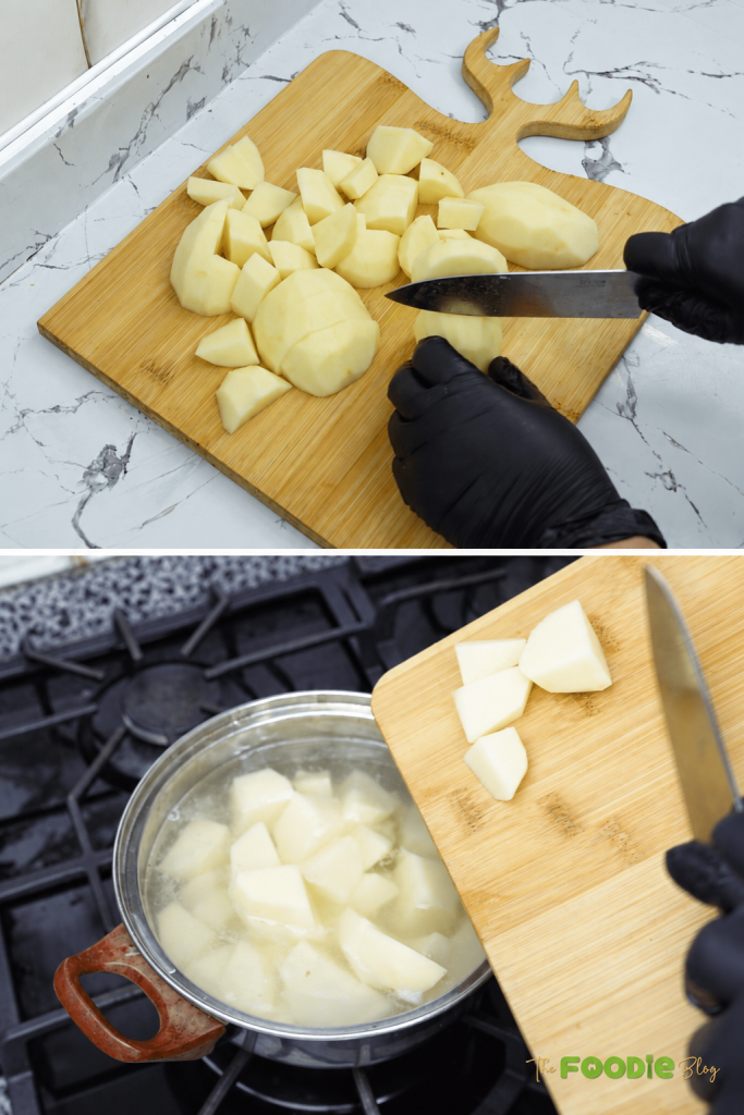 Peeled potatoes being cut into chunks before boiling for homemade potato balls.