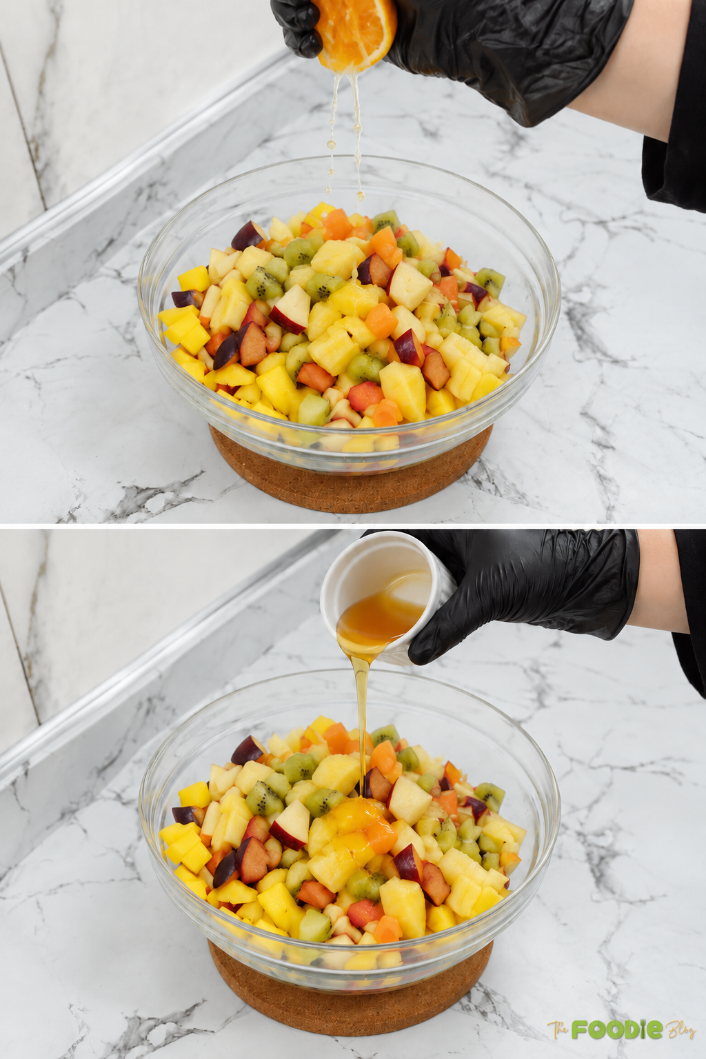 Orange juice and honey being poured over a bowl of chopped mixed fruit.