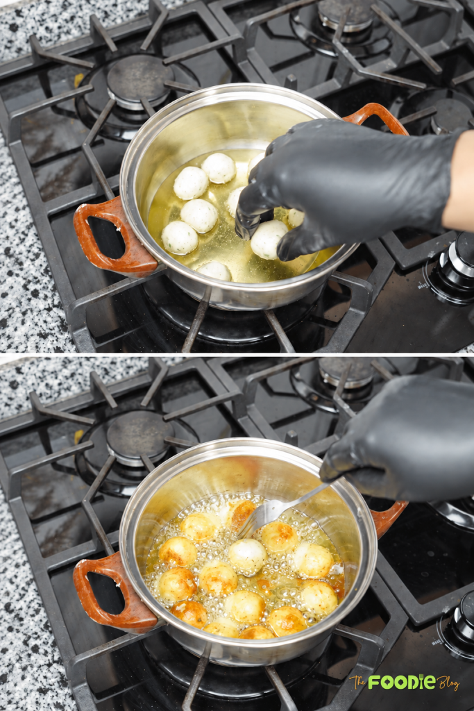 Homemade potato balls frying in hot oil until crisp and golden brown.