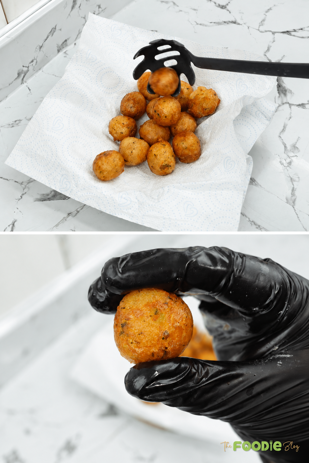 Golden crispy potato balls draining on paper towels after frying.